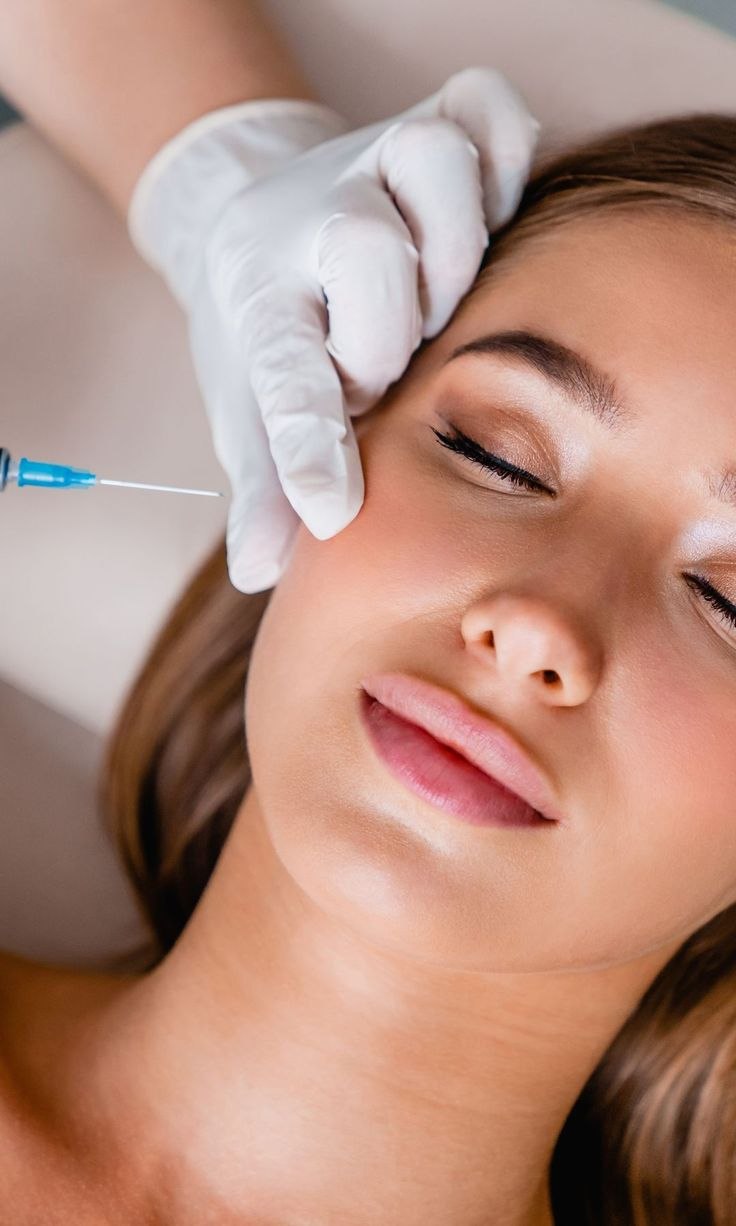 Physician administering a Botox injection